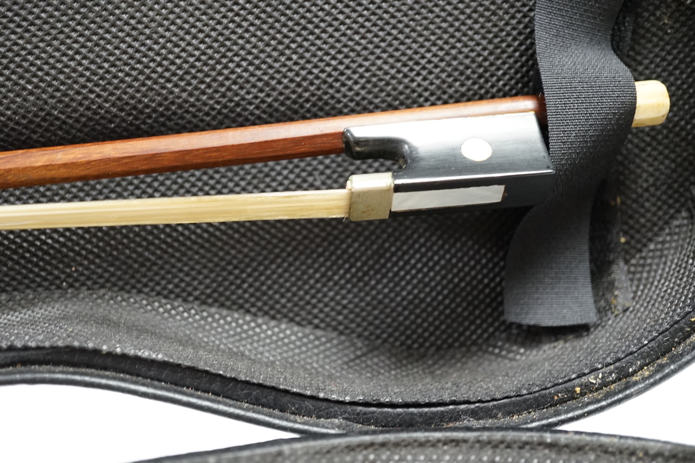 An unusual travelling violin (Pochette), length of body, 25.5cm, with standard length neck, with shorter 53.5cm bow and fitted case, overall length of violin 55cm